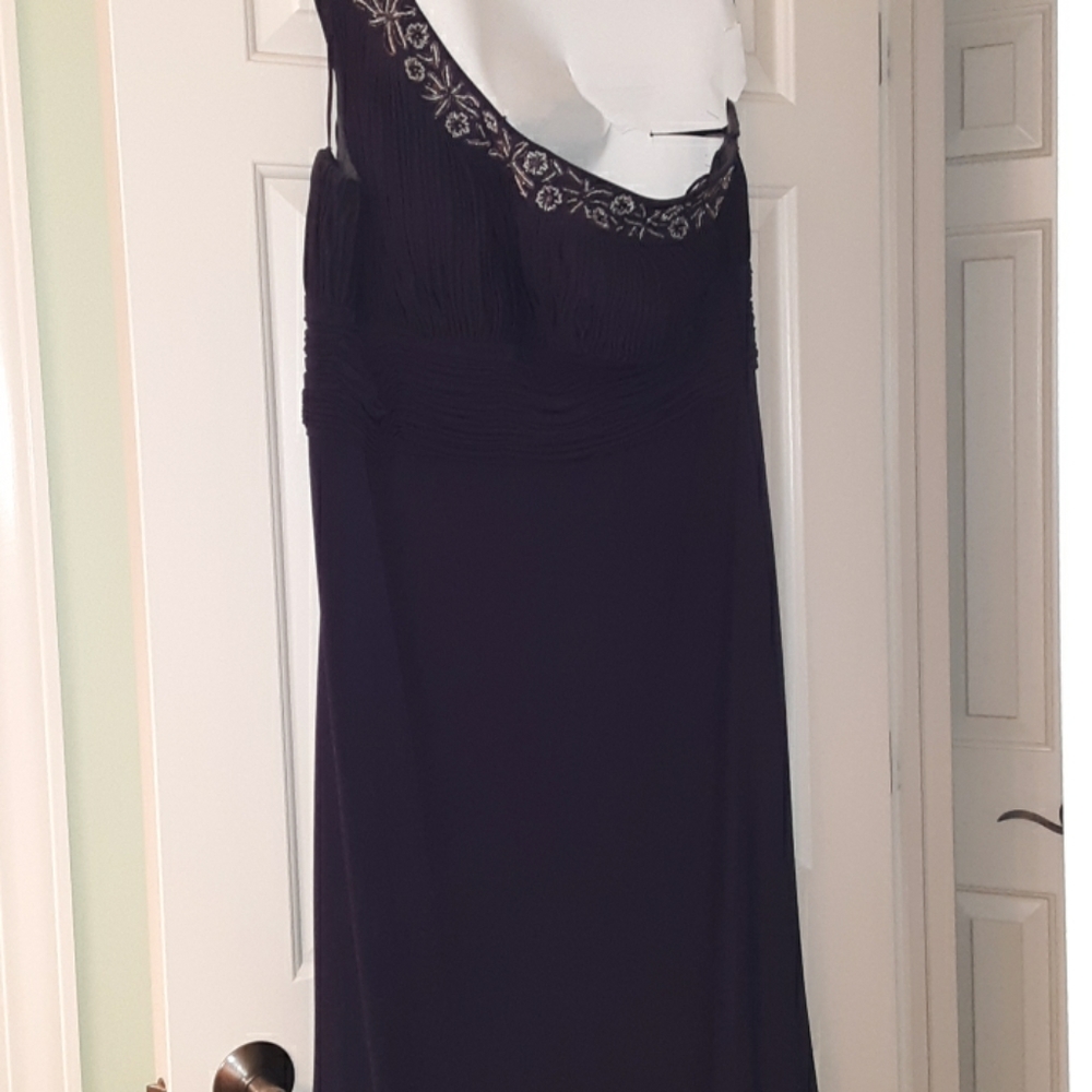 A dark plum colored dress
